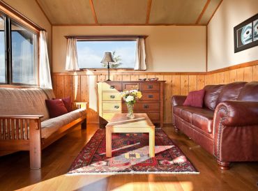 Tanglewood Cabin Accommodation - Interior Living Room in Morning Sunlight